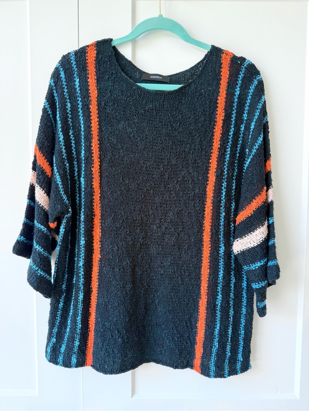 Cozy Black Knit Sweater with Blue and Orange Stripes